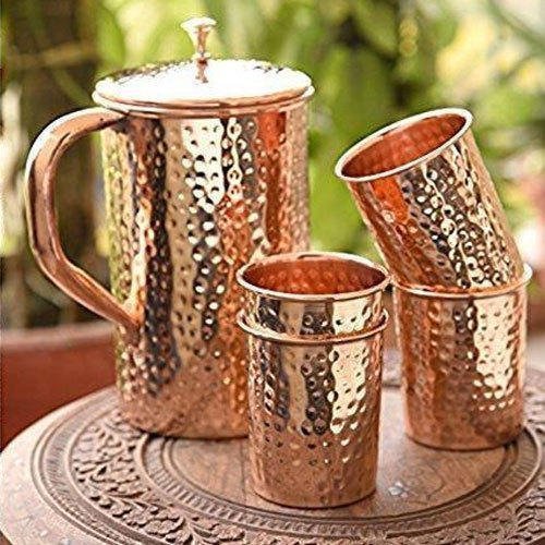Hammered copper pitcher and glass combo