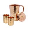 Hammered copper pitcher and glass set