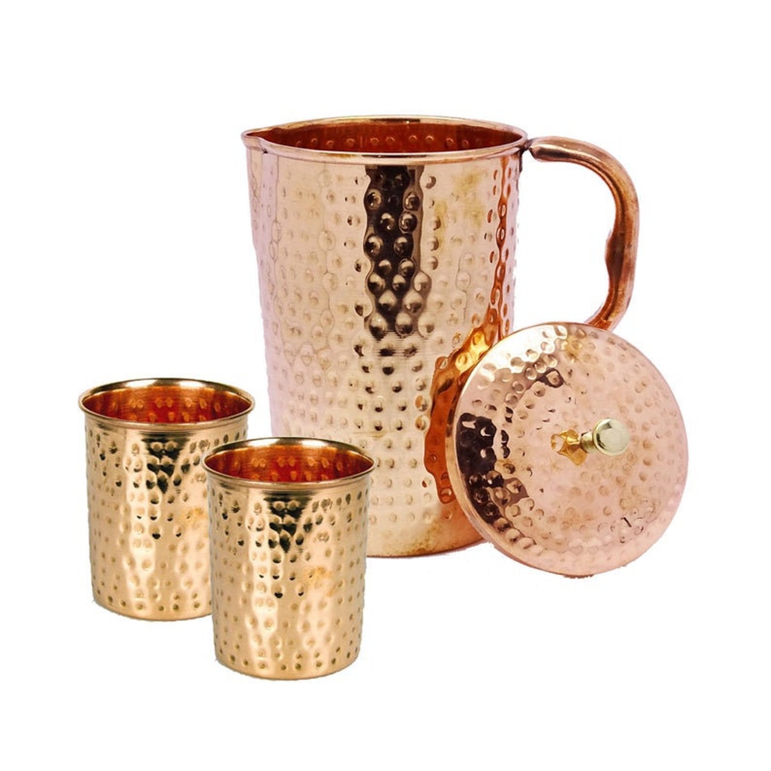 Hammered copper pitcher and glass set